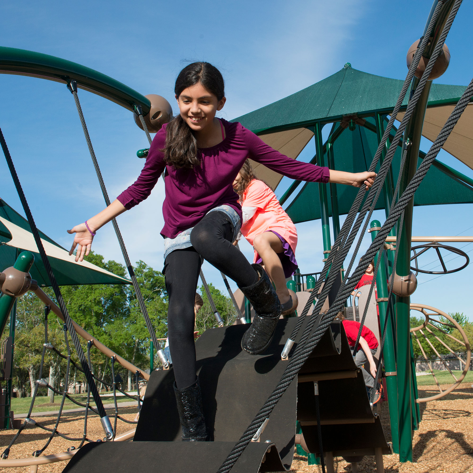 Girl playing on Playground at Sienna