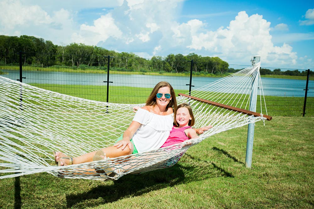 Sienna family relaxing on hammock with on-site conveniences