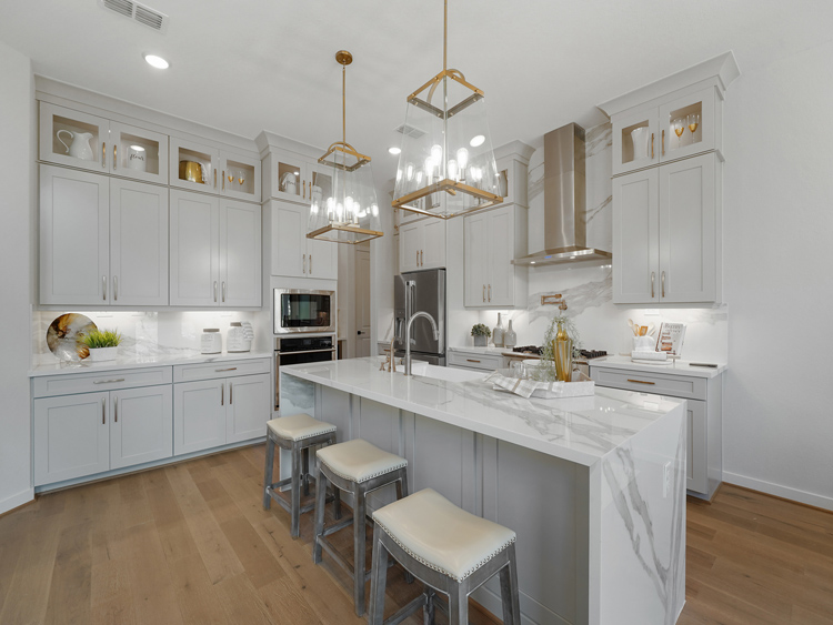 Village of Sienna Oaks first model home kitchen’s broad island